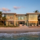 Impact windows installed on a modern Florida home protecting against hurricane winds